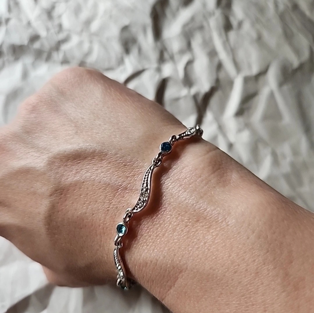 Elegant Silver Bracelet with Blue Accents